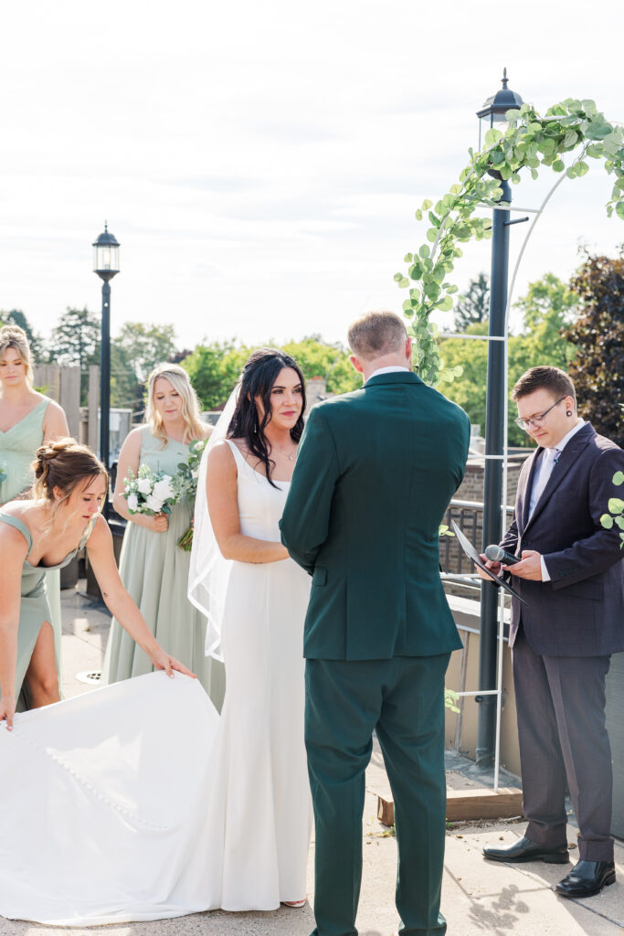 A bride and groom meet at the end of the aisle. 

Central Illinois Wedding Photographer.

Amanda Banik Photography