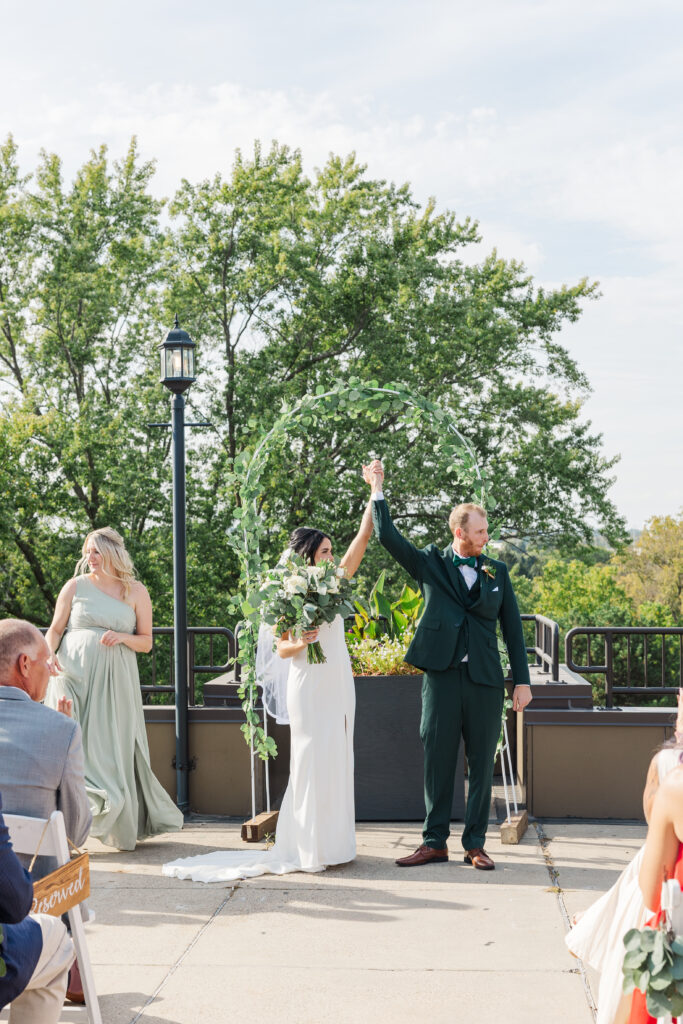 A bride and groom celebrate after their ceremony. 

Central Illinois Wedding Photographer.

Amanda Banik Photography
