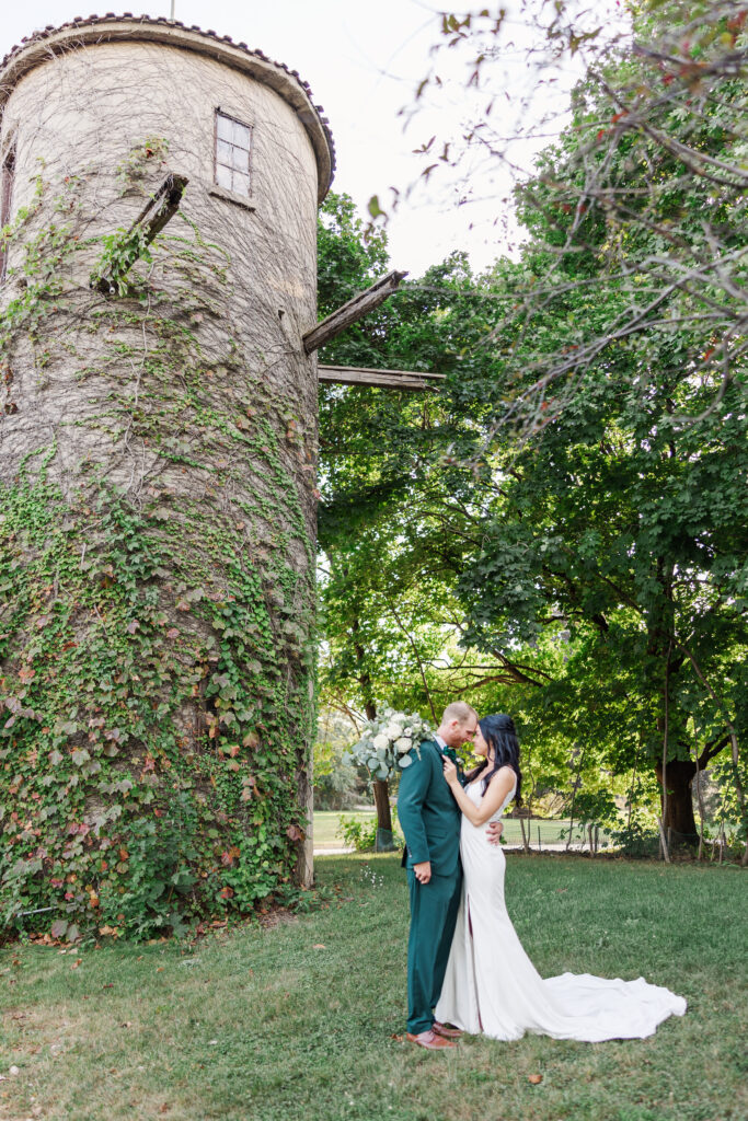 A bride and groom pose for a photo. 

Central Illinois Wedding Photographer.

Amanda Banik Photography