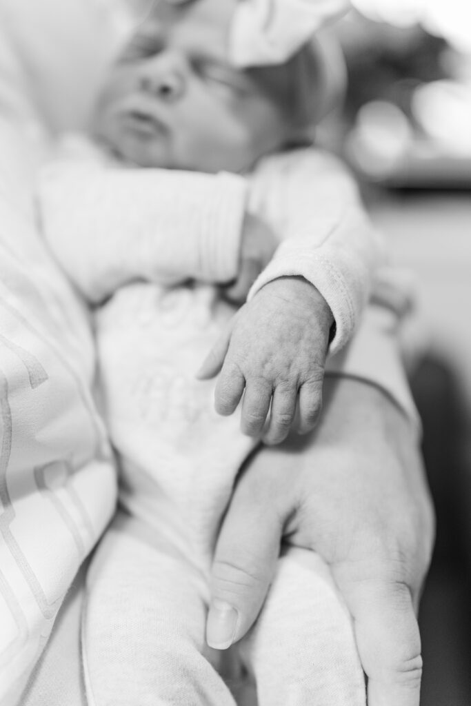 A detail image of a newborn's hand during a Fresh 48 Session in Champaign, IL

Photos by Amanda Banik Photography