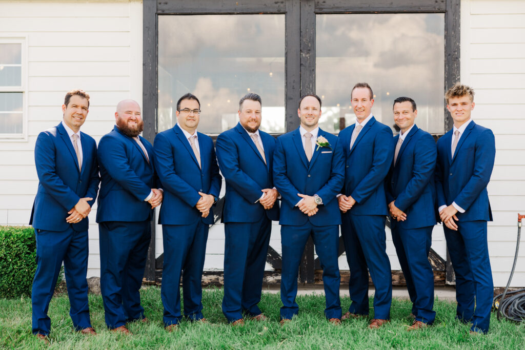 Groomsmen pose for a photo outside the barn at Northfork Farms, Oswego, IL

Photos by Amanda Banik Photography.