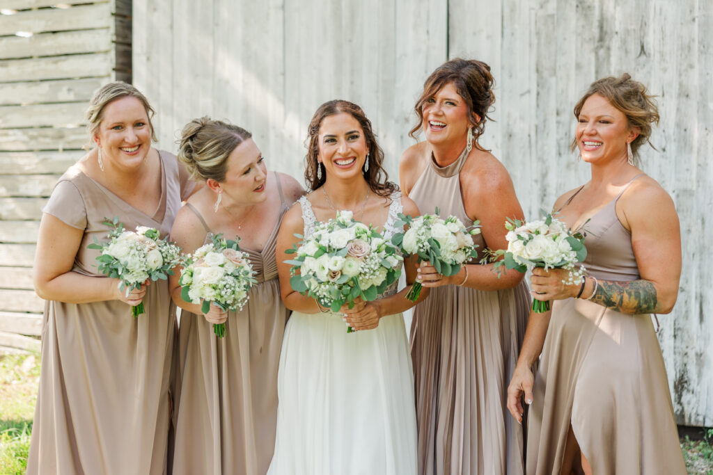 Bridesmaids pose for a photo at Northfork Farms, Oswego, IL

Photos by Amanda Banik Photography.