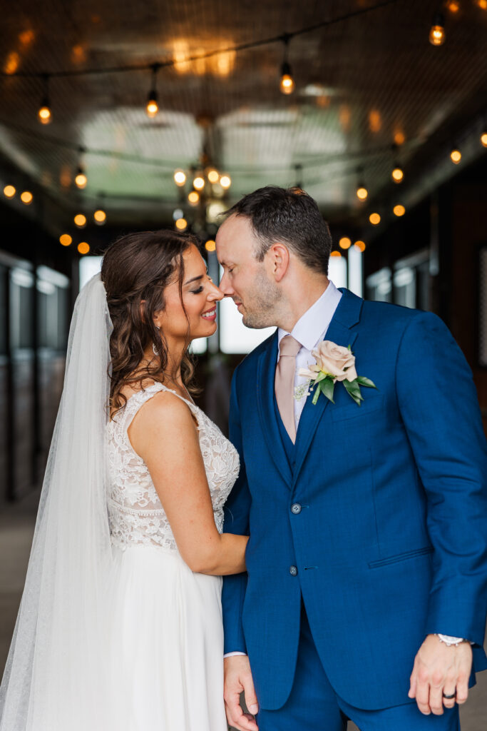 A bride and groom pose for a photo in the barn at Northfork Farms. 

Photos by Amanda Banik Photography