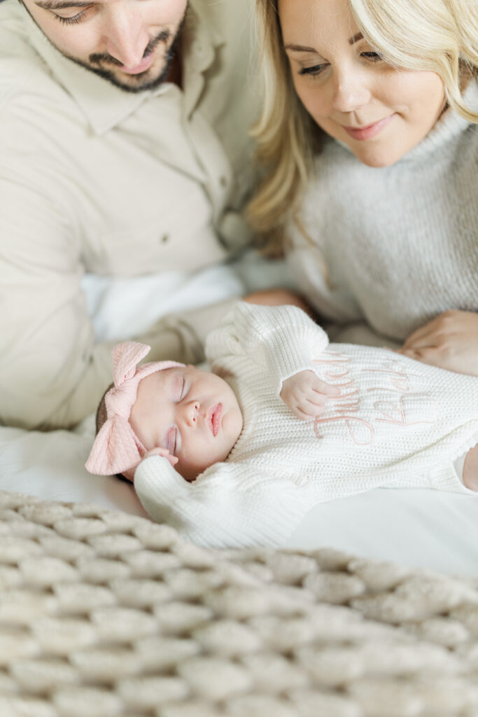 A baby girl sleeps soundly during her Champaign, IL in home newborn session.
Central Illinois Newborn Photographer.
Amanda Banik Photography