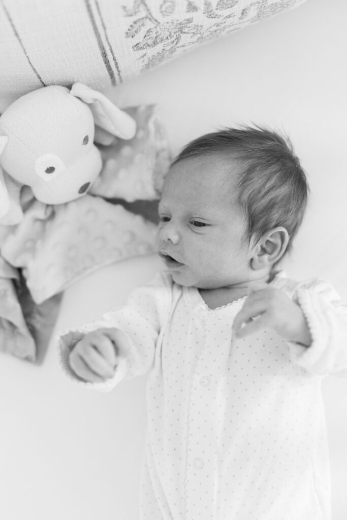 A black and white image of a newborn baby during his Central Illinois in home newborn session

Photos by Amanda Banik Photography