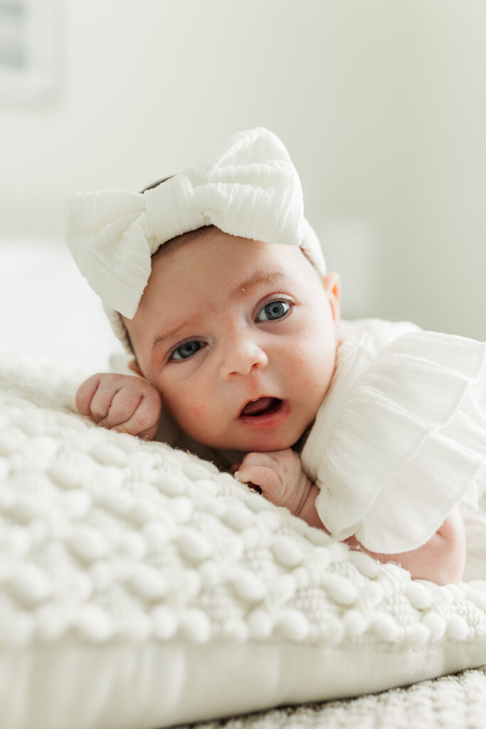 A newborn baby girl lays on a pillow. 

Central Illinois in-home newborn session 

Photos by Amanda Banik Photography